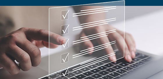 person taking a survey on laptop v2